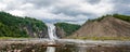 Cloudy summer day with insane view of beautiful and powerful Montmorency waterfall Cloudy summer day with insane view of beautiful