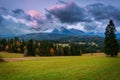 A cloudy sunrise over the autumnal Tatra Mountains. The pass over Lapszanka in Poland Royalty Free Stock Photo