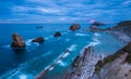 Cloudy sunrise on the rocky beach of Arnia in Cantabria