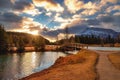 Cloudy Sunrise Sky Glowing Over Cascade Ponds Royalty Free Stock Photo