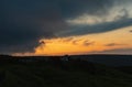 Cloudy sunset over panorama of Karkonosze Giant Mountain Royalty Free Stock Photo