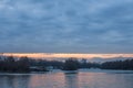 Cloudy sunset over usce, the confluence between the sava and the danube dunav river and the panorama of New Belgrade Royalty Free Stock Photo