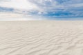 Cloudy tropical landscape. Beach view with sand and sea under overcast sky Royalty Free Stock Photo