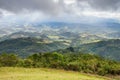 A cloudy view from Pico Agudo - a high mountain top with a 360 degree view of the Mantiqueira Mountains Royalty Free Stock Photo