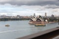 Ferry boats arriving to the Harbour of Sydney on a cloudy winter day