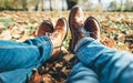 Clouse up image couple in love legs in comfortable laser shoes a