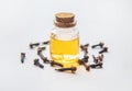 Clove essential oil in a small bottle. Selective focus