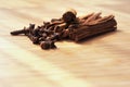 Clove spice cinnamon sticks on a wooden board Royalty Free Stock Photo