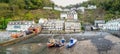 CLOVELLY, DEVON, ENGLAND - MAY 2 2023: Panoramic view of boats in the harbour at Clovelly, a small village on the Royalty Free Stock Photo