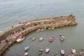 CLOVELLY,DEVON,UK -August 1st 2013: The sea wall protecting Clovelly harbour. This charming traditional fishing village is a pop