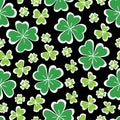 Clover leaf hand drawn doodle seamless pattern vector illustration on black background. St Patrick`s Day symbol, Irish Royalty Free Stock Photo