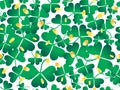 Clover leaves and golden coins seamless pattern. St. Patrick`s Day, Irish holiday. Background for greeting card, wrapping paper, Royalty Free Stock Photo