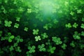 Clover leaves on green background. Three-leaved shamrocks. St Patrick Day holiday symbol. Royalty Free Stock Photo