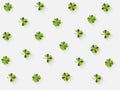 Clover with a long shadow in the flat style on a light background. Happy St. Patrick`s Day. Vector