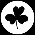 Cloverleaf on a black and white background. Silhouette of the magical plant. Decoration for St. Patrick`s Day, trefoil, Shamrock.