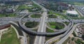Cloverleaf intersection with circular overpass, aerial view Royalty Free Stock Photo