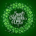 Clovers and original lettering St. Patrick's Day on a green wreath background.