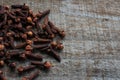 Cloves on wooden background