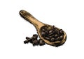 Cloves on the wooden scoop