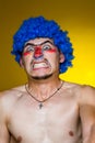 Clown in a blue wig Royalty Free Stock Photo