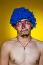 Clown in a blue wig Royalty Free Stock Photo