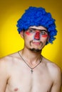 Clown in a blue wig Royalty Free Stock Photo