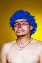 Clown in a blue wig Royalty Free Stock Photo