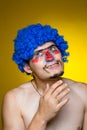 Clown in a blue wig Royalty Free Stock Photo
