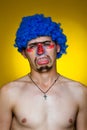 Clown in a blue wig Royalty Free Stock Photo