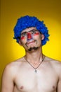 Clown in a blue wig Royalty Free Stock Photo