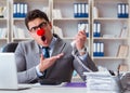 Clown businessman angry frustrated working in the office Royalty Free Stock Photo