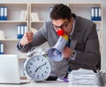 Clown businessman in the office angry frustrated with megaphone Royalty Free Stock Photo