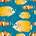 Clown fish and Yellow chaetodon butterflyfish on a blue creating a seamless pattern