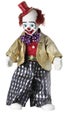 Clown doll with red top hat and spotted bow tie Royalty Free Stock Photo