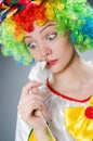 Clown with electric plug in funny concept