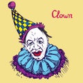 The clown in funny bright checkered hat smiling