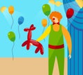 Clown Holding in Hands Red Balloon in Shape of Dog