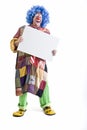 Clown holding sign Royalty Free Stock Photo