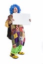 Clown holding sign Royalty Free Stock Photo