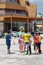 Clown and kids on the street