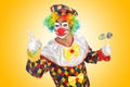 Clown with lollipops Royalty Free Stock Photo