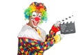 Clown with movie board Royalty Free Stock Photo