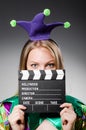 Clown with movie clapper Royalty Free Stock Photo