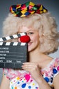 Clown with movie clapper Royalty Free Stock Photo