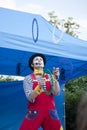 Clown during outdoor performance on Kids Day