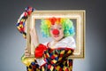The clown with picture frame in funny concept Royalty Free Stock Photo