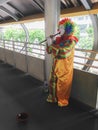 Clown playing flute