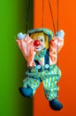 Clown puppet toy on bright background Royalty Free Stock Photo