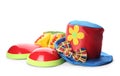 Clown shoes, bow and hat on white background Royalty Free Stock Photo