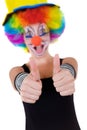 Clown showing ok sign with her fingers